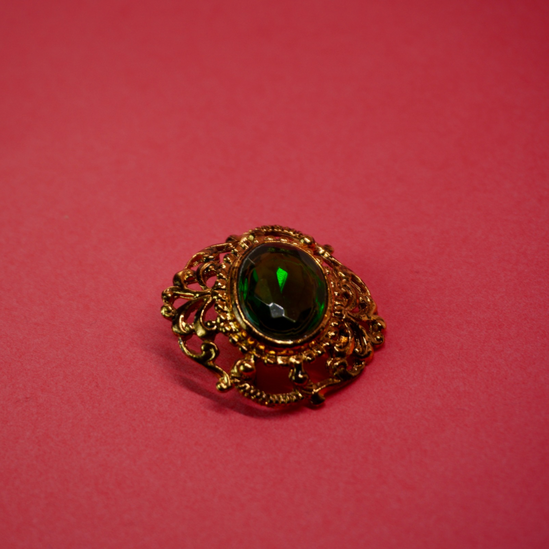 Gold filigree vintage brooch green