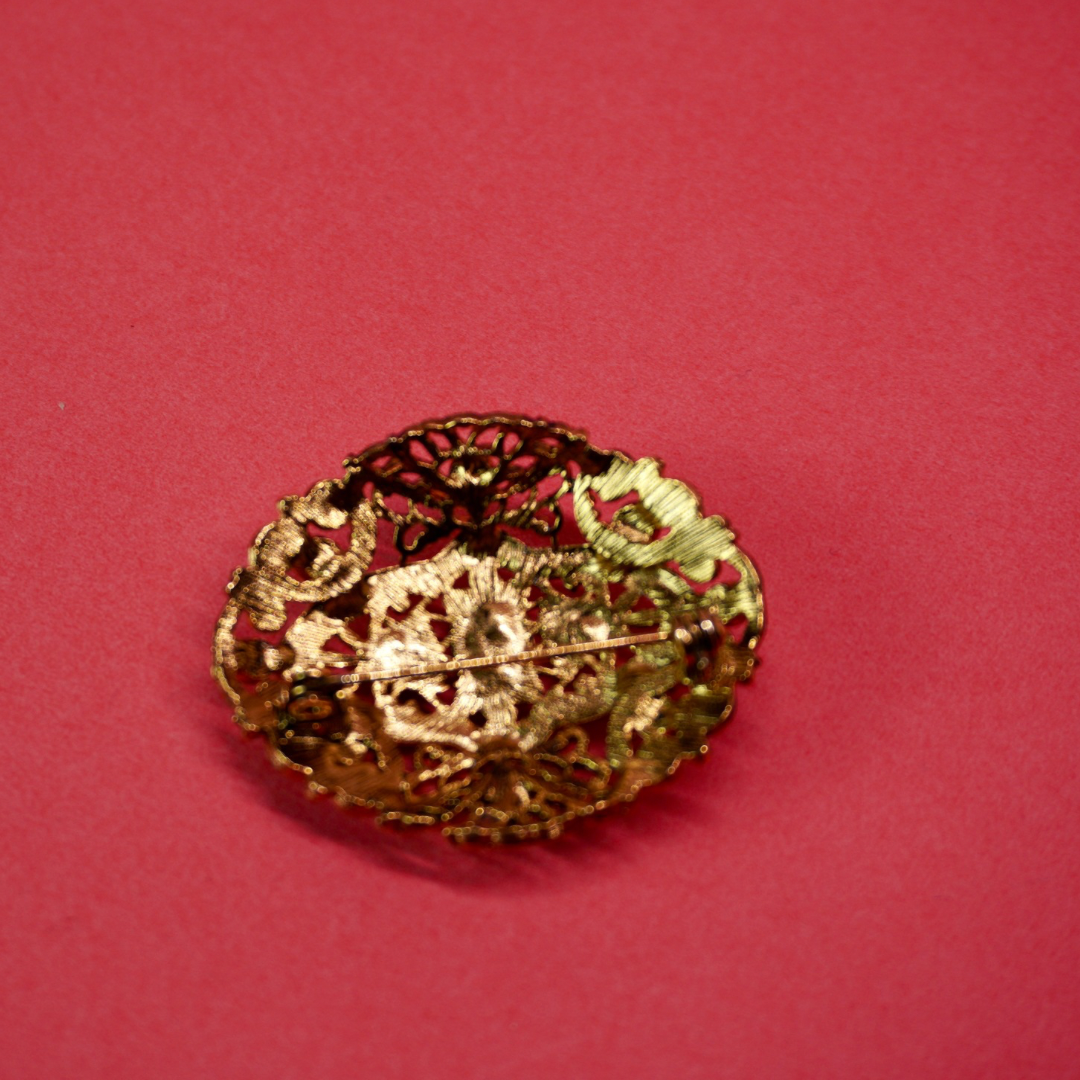 Gold filigree vintage brooch