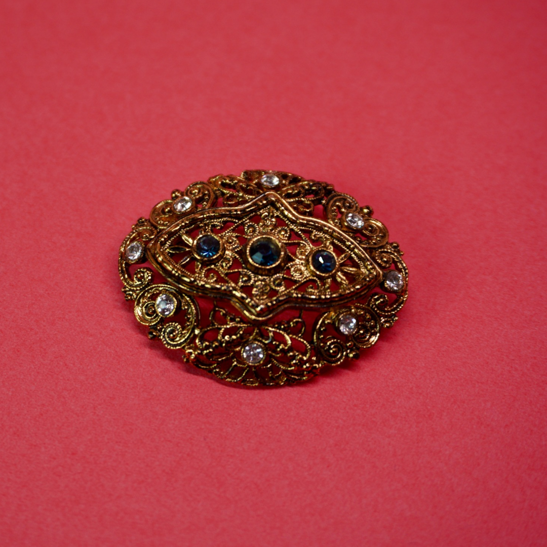 Gold filigree vintage brooch