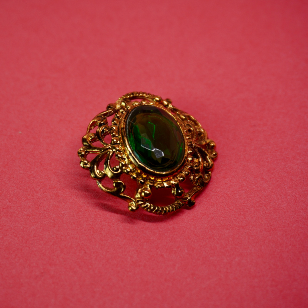 Gold filigree vintage brooch green