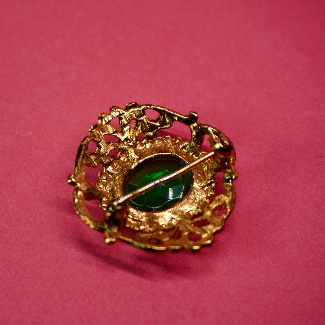 Gold filigree vintage brooch green