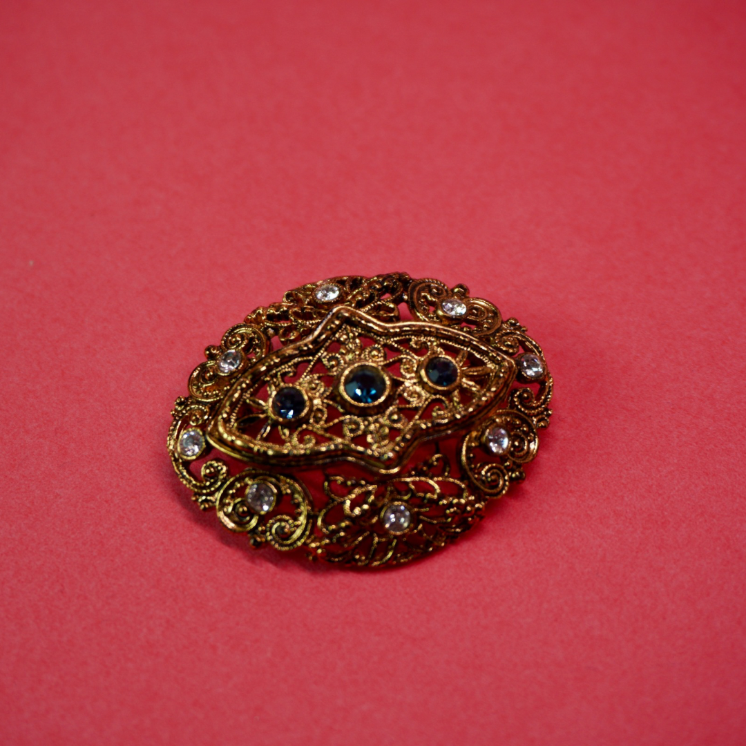 Gold filigree vintage brooch